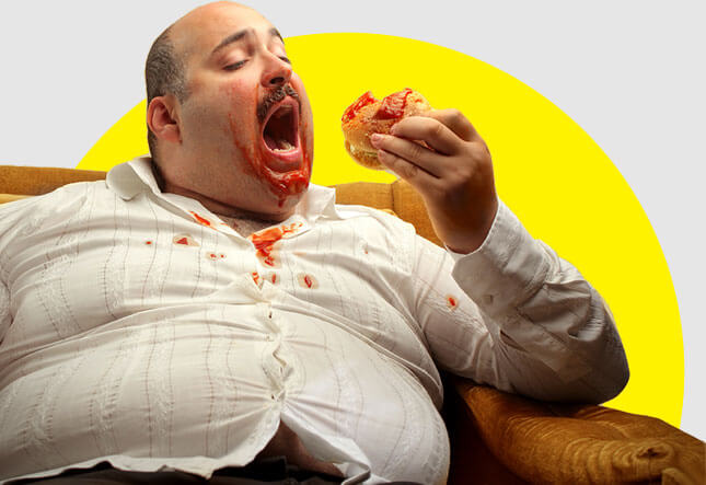Overweight man eating on chair